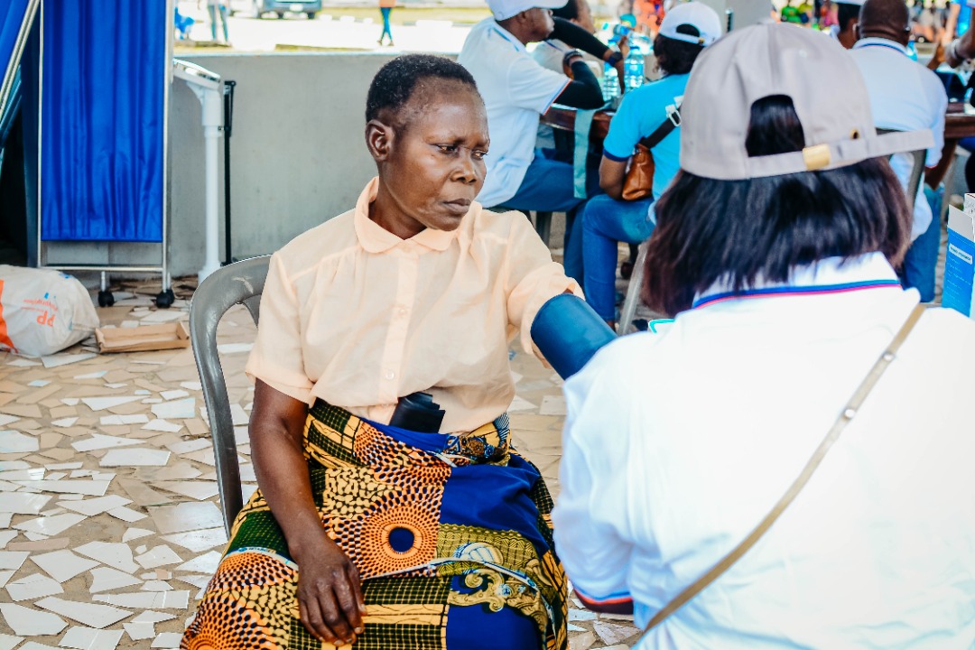 Medical team assisting a community member